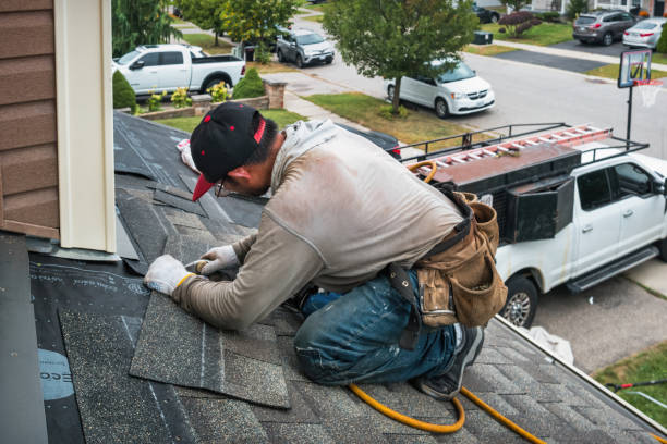 Professional Roofing technician working in Tussy, OK